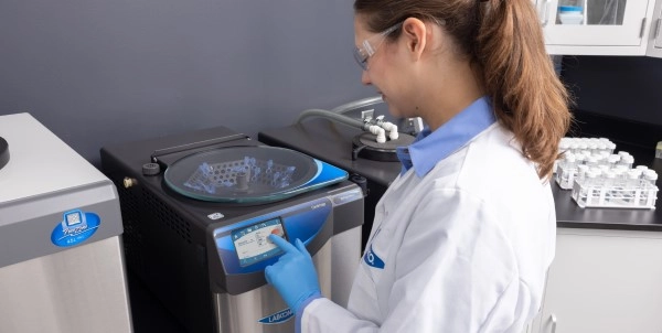 New Centrivap Pro on a lab bench being used by a woman researcher