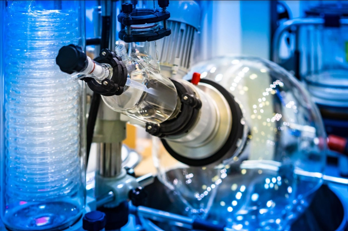 Image of a Rotary evaporatorshowing the rotating flask and vertical condenser