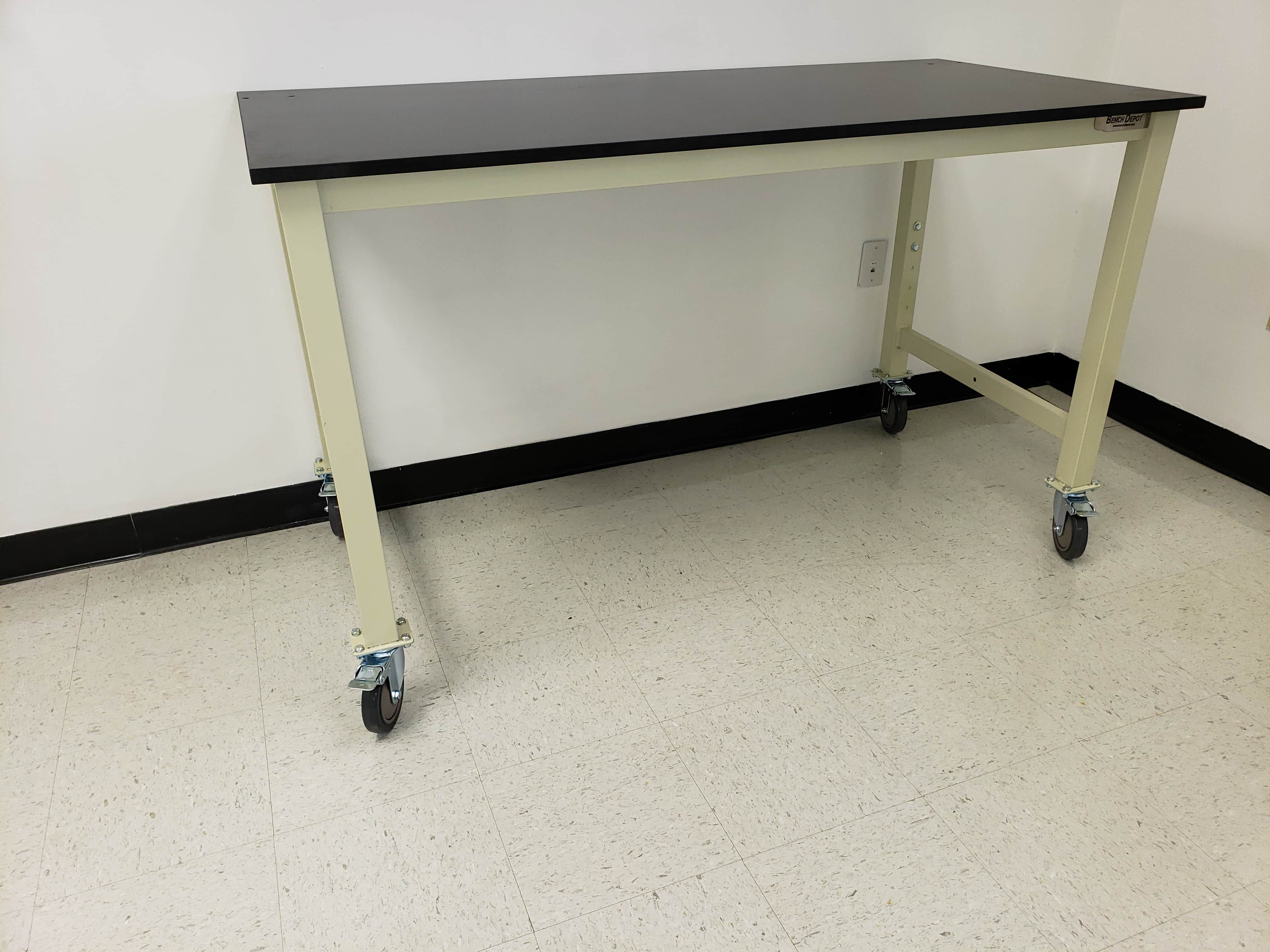 4 foot lab table with casters (NEW) | 30"D x 48"L x 36"H