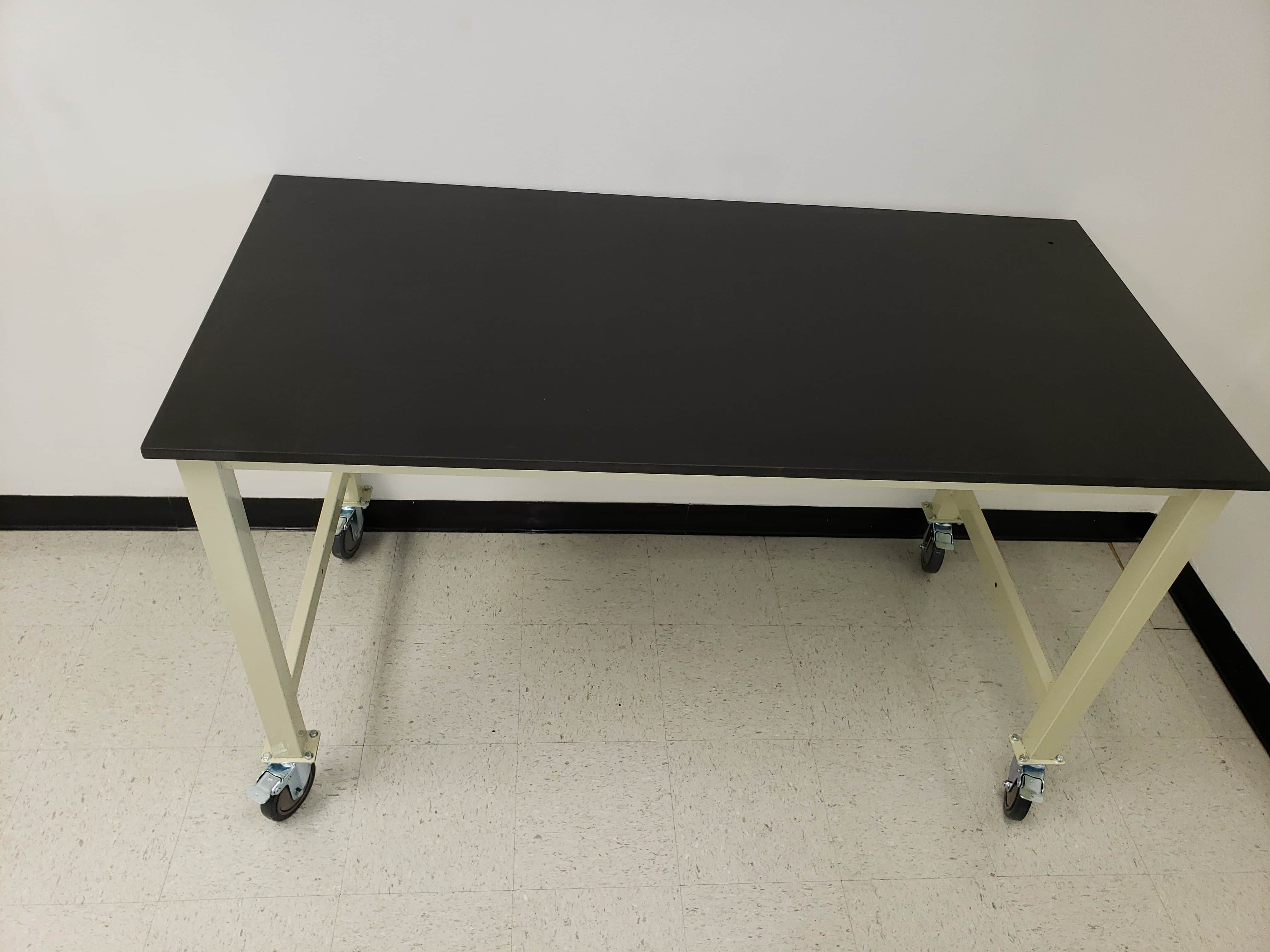 4 foot adjustable lab table (48" long x 30" deep) with phenolic resin countertop (NEW)