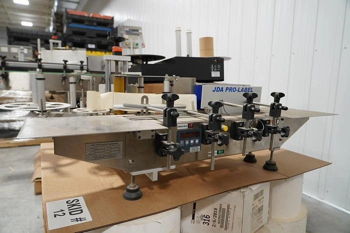 Used JDA Model-1 Tabletop Wraparound Labeler with Easyrun Controls