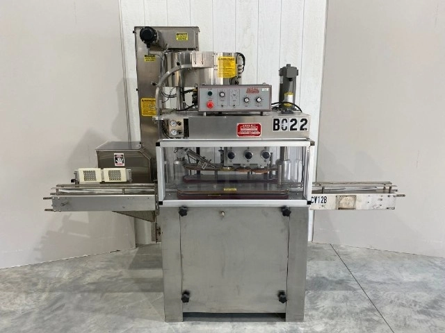 Kaps All 6-Spindle Capper with Elevator