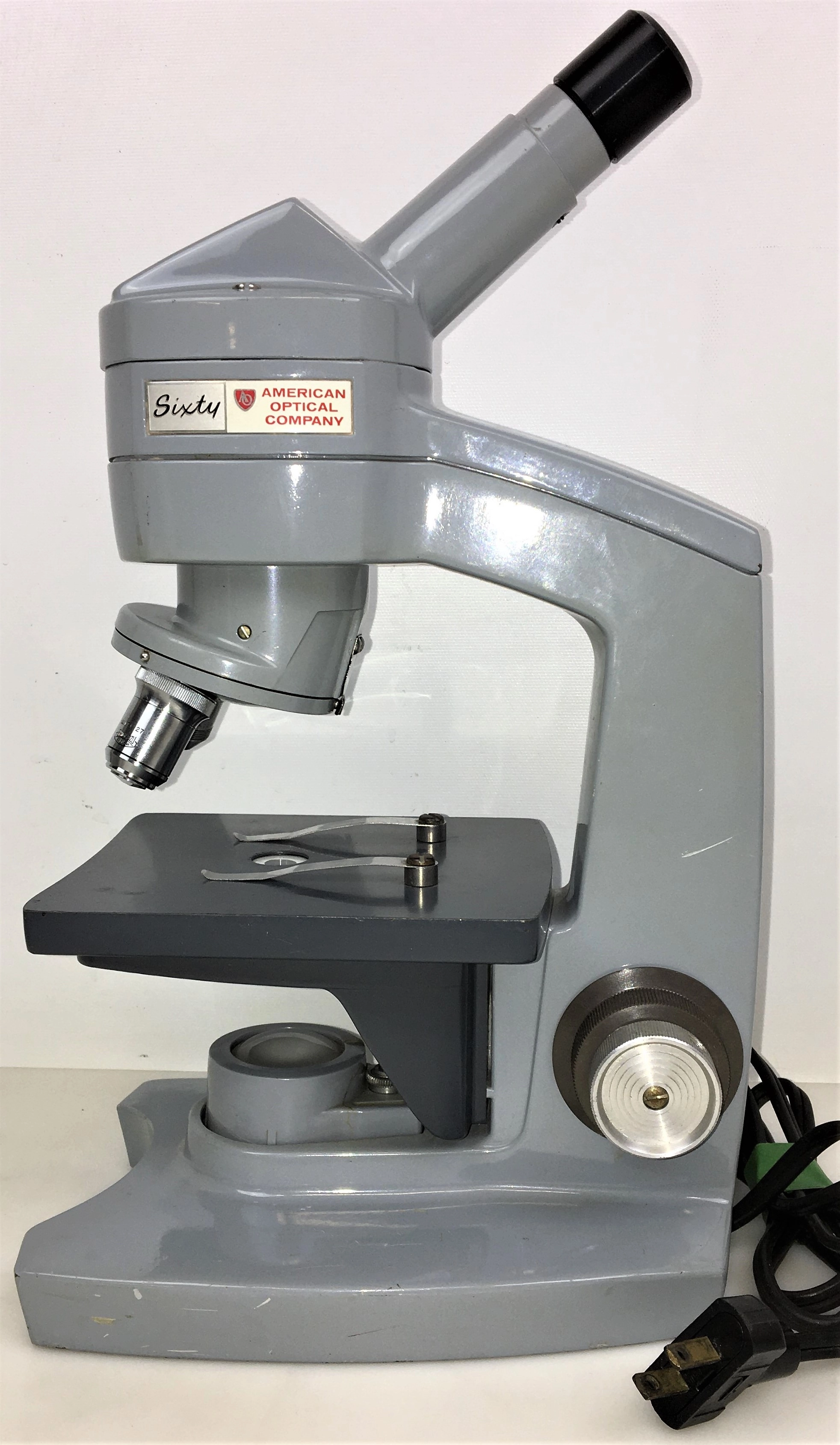American Optical Sixty Monocular Microscope (100X to 1000X)