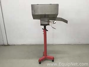 Used Vibratory cap feeder feeding system with adjustable stand