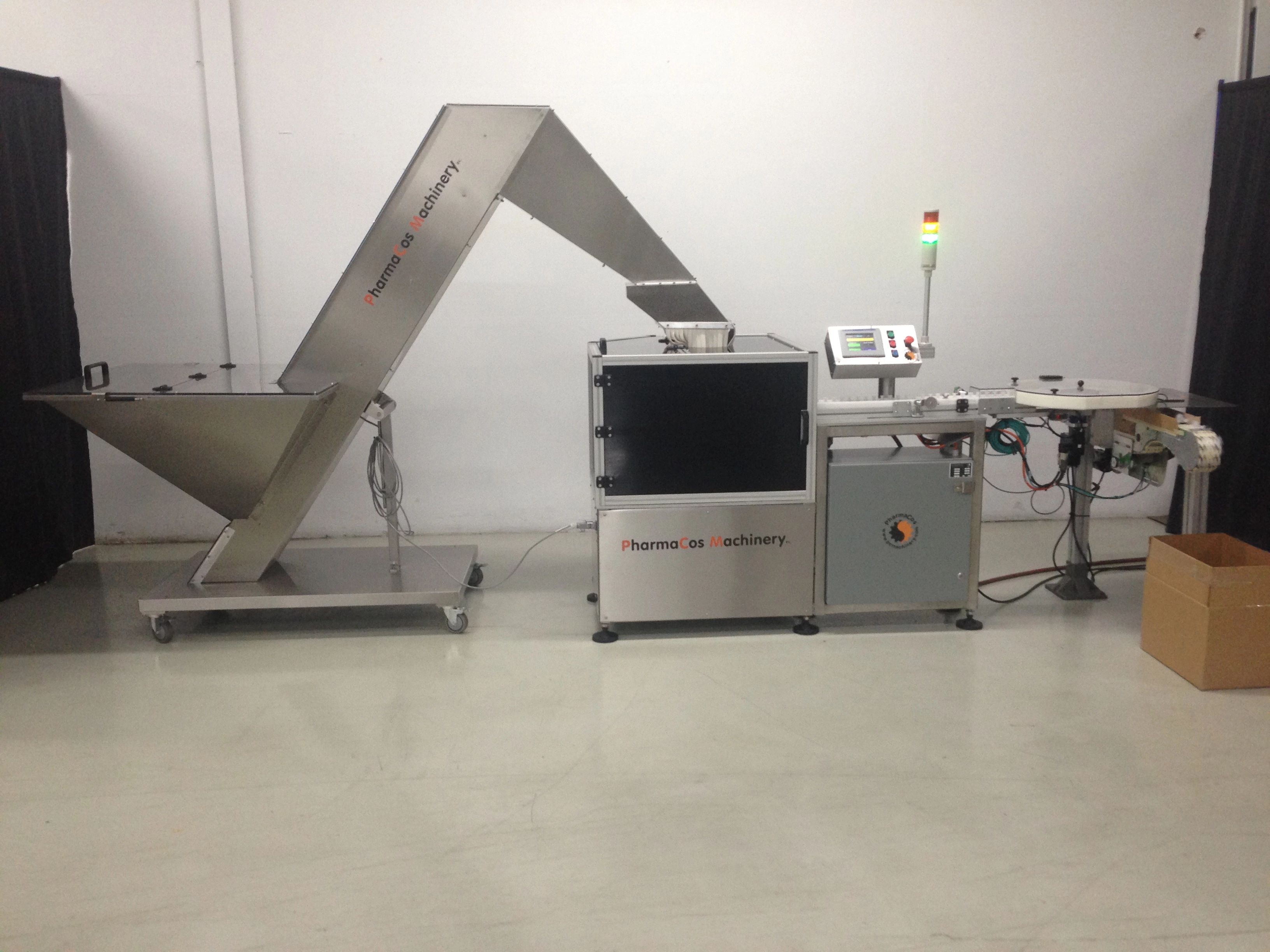 New PCM comb feeder with centrifugal sorting bowl, elevator-hopper and starwheel indexing system