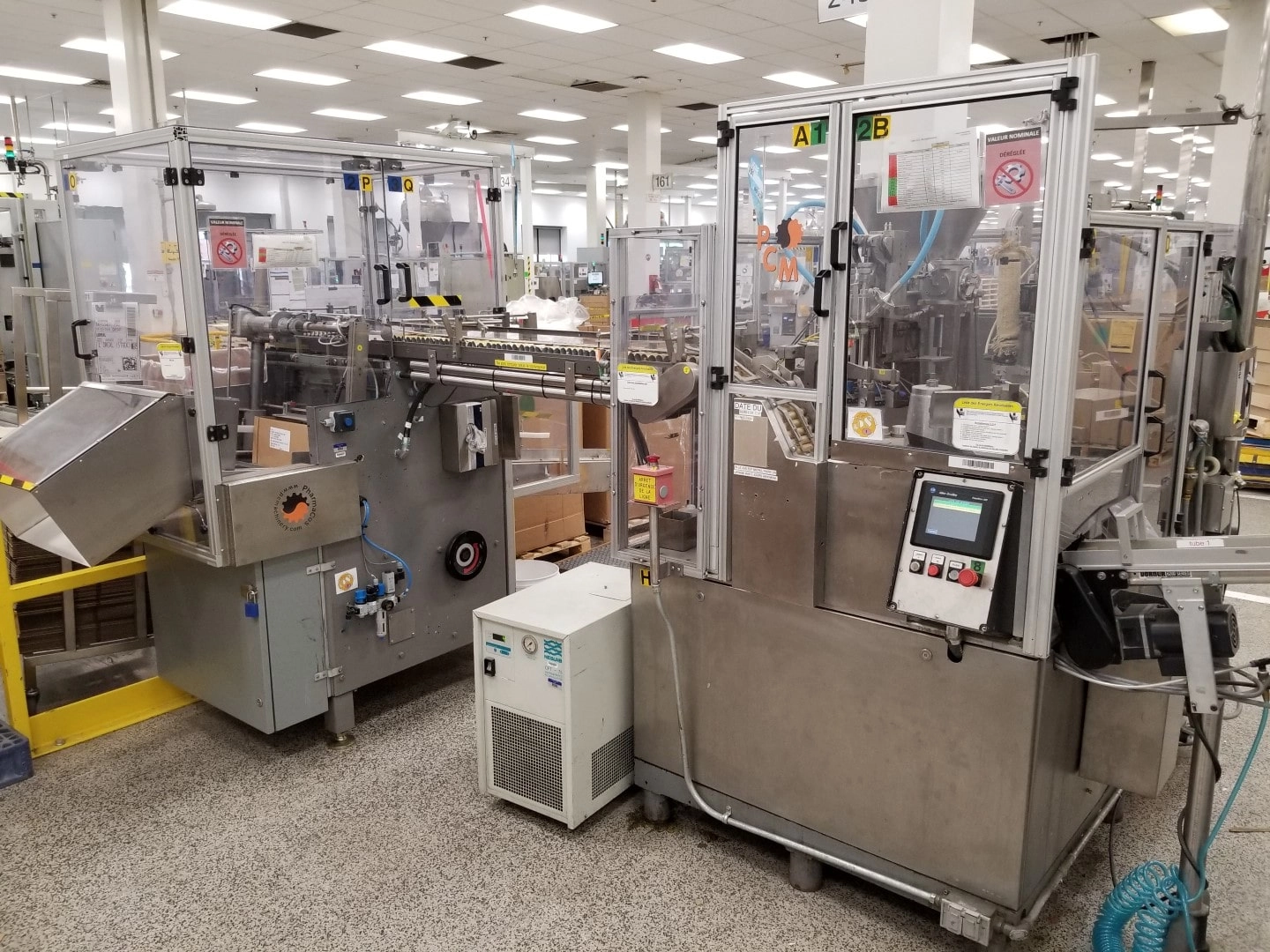 Used IWKA TU200P plastic tube filler with TZ101 tube feeder and LARGE cabinet with MANY parts