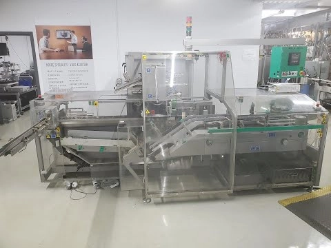 Used Marchesini horizontal cartoner model MA155 with Guk leaflet feeder