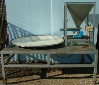 48" ROUND ROTATING TABLE, WITH SYNTRON VIBRATING FEEDER AND HOPPER, CONTROLLER = FMC SYNTRON POWER P