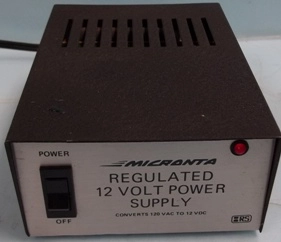 MICRONTA REGULATED 12 VOLT POWER SUPPLY CONVERTS 120 VAC TO VDC CAT NO 22-124 120 VAC 60 HZ 60 WAT