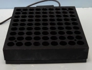 HEATING BLOCK 81 SAMPLE HOLES, DIMENSIONS OF BLOCK IS 12 X 13 1/3 X 2 5/8, DIMENSIONS OF HOLES 1", N