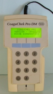 ROCHE DIAGNOSTICS BATTERED COAGUCHEK PRO DM : UD 2805693 WITH POWER CORD VERSION: C PRO 231