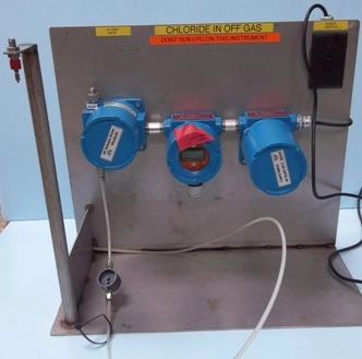 CHLORINE IN OFF GAS DETECTION SYSTEM STAINLESS STEEL CONSTRUCTED STAND CONSISTING OF: 1) SAMPLE CYL