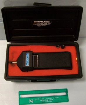 COLE PALMER TACHOMETER MODEL: 8213-20, 0-9999 RPMS, INCLUDES PLASTIC CARRYING CASE AND 2 ATTACHMENTS