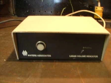 WATERS ASSOCIATES LIQUID VOLUME INDICATOR (THE D BATTERY HAS BEEN REMOVED FROM THE INSIDE FOR STORA