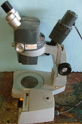 AO INSTRUMENT COMPANY MICROSCOPE MODEL: 569 7 TO 30 X WITH TRANSFORMER MODEL: 365 AND LIGHT SOU