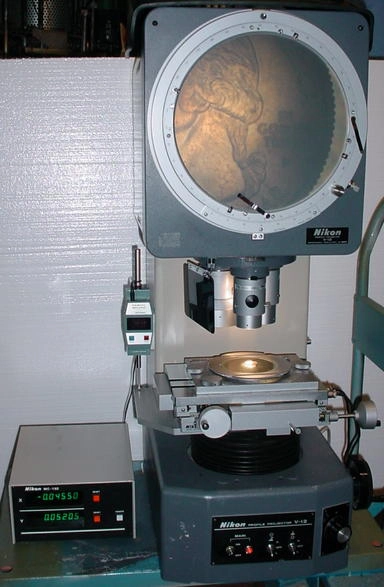 Lenses for a Nikon V-12B optical comparator&nbsp; 5, 10, 20, 50 and 100 magnification . Also M Plan booster with 20 and 25 power objectives. Lenses only, no compartor is included