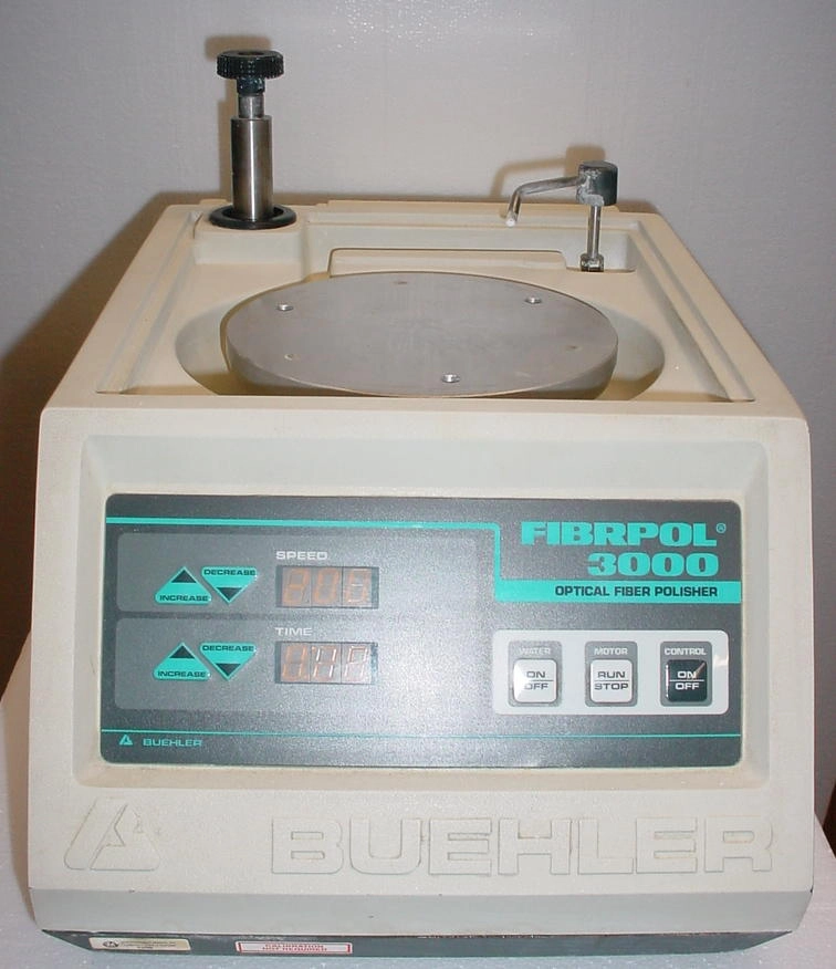 Buehler Fibrpol 3000 8" variable speed polisher 50-200 rpm with timer and oscillating post to accept a fiber optical polishing head (not included) model 69-7000 Can be used similar to the Ecomet3 for manual polishing but lower speed and HP. Note, water controlled by manual valve in the top rear.85-264 volts