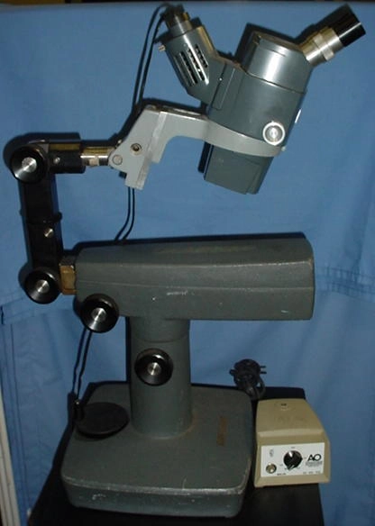 A/O 580X , 1 to 6x w/coaxial illuminator and 10 x eyepieces, and boom stand