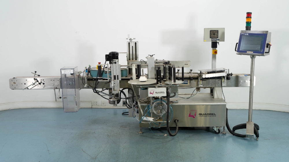 Quadrel Labeling Systems VersaLine Labeling Machine