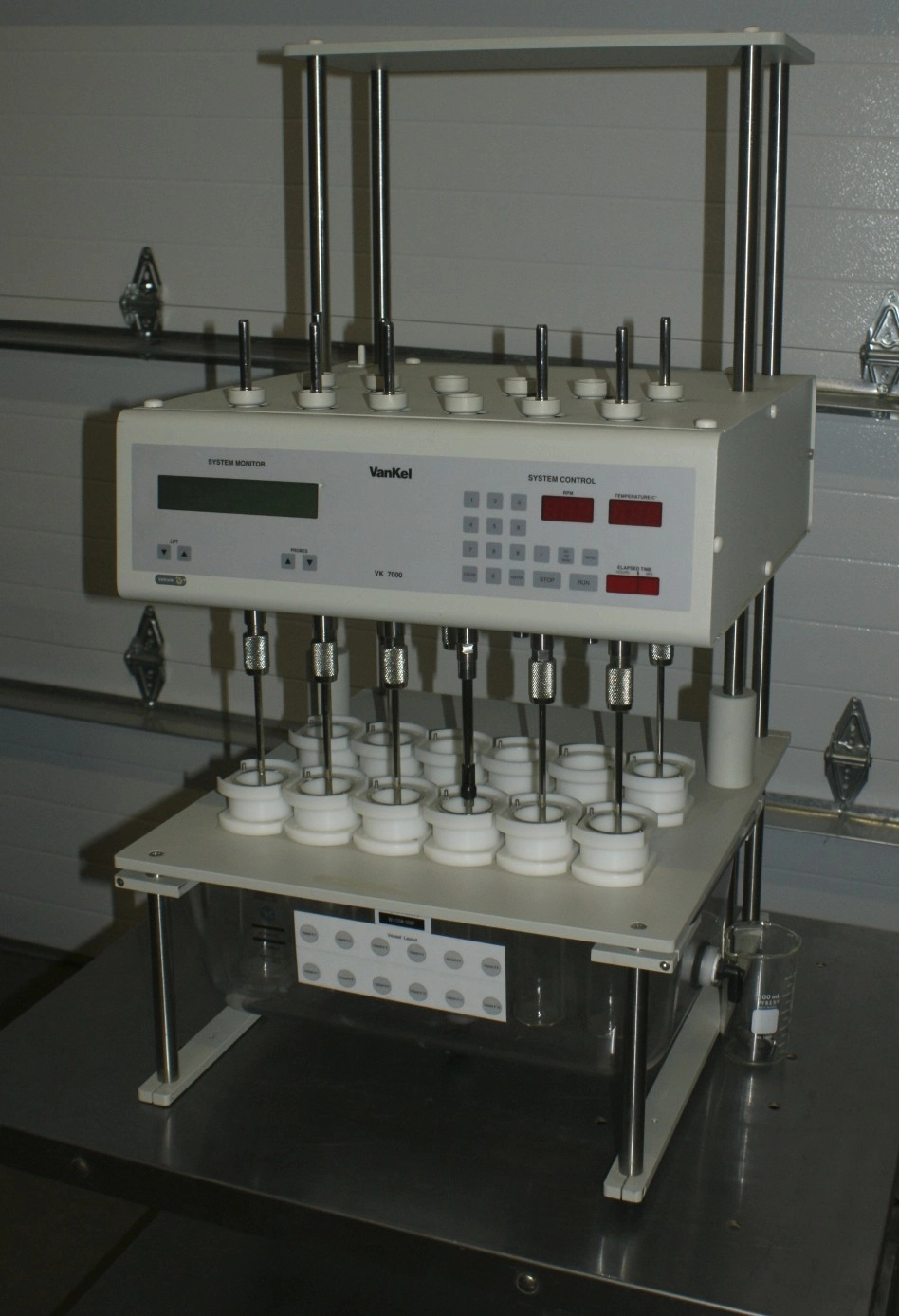 Varian Vankel VK- 7000  P/N 10-5000 System that is a 12 Position Dissolution System with 750D Heater Circulator with Temperat