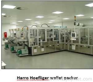 Harro Hoeflinger Wallet Packing Line With Uhlmann UPS 1030 Blister Sealer and Uhlmann C2206 Cartoner