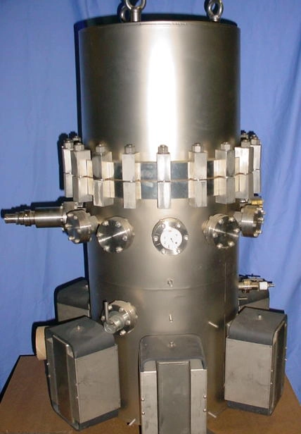 VARIAN VT-114 14" UHV system includes: 14" ID ss vacuum cylinder w/nine 2 &frac34;" Conflat ports, poppet isolation valve and 12" tall ss bell jar w/14". Wheeler flange. Pumping equipment includes 6 triode ion pumps with a total pumping speed of 240 l/s, multi-filament titanium sublimation source, cryo panel and dual Vacsorb roughing system w/manifold. Electronics include Varian 921-0066 ion pump power supply, Varian 922-0043 TSP power supply, Varian 845 digital ionization gauge controller and b