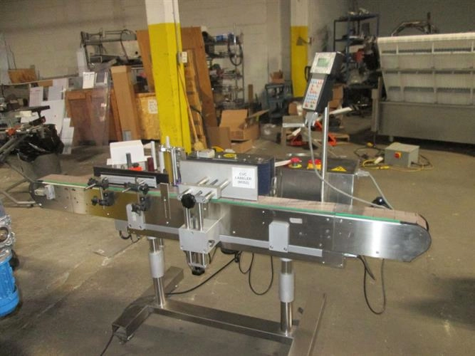 Used CVC 300 Pressure Sensitive wraparound Labeler with Coder | LabX.com