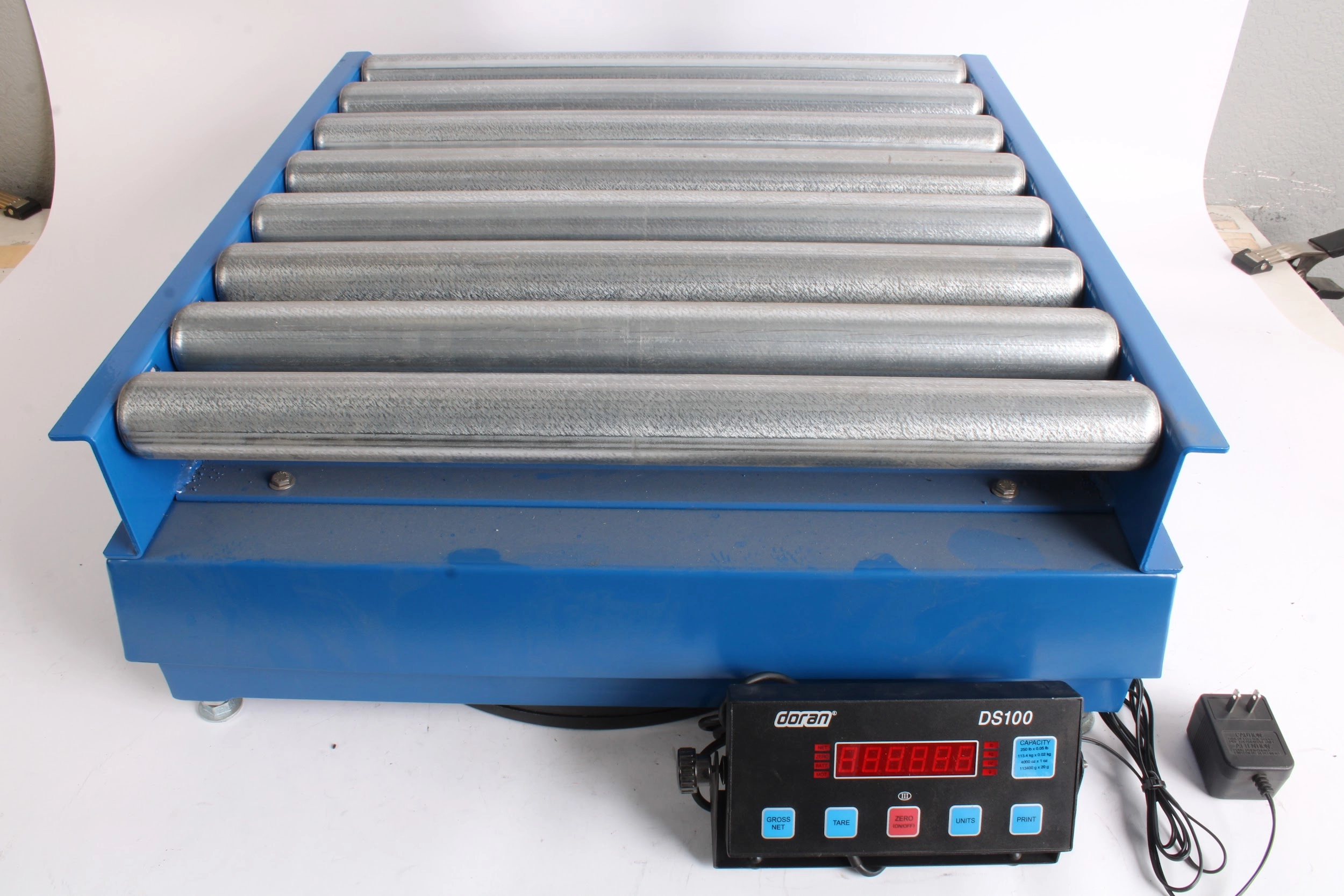 Doran DS100 Scale Indicator + DMS5250 Scale 250 Capacity + Conveyor Roller Table