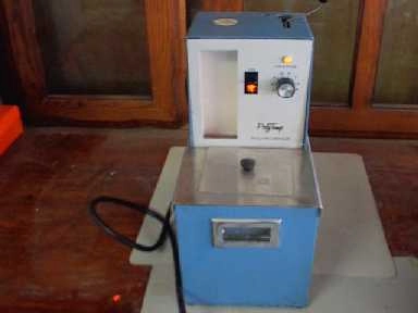 POLYSCIENCE POLY TEMP HEATING BATH MODEL 80 758241, THE HEATING AND PUMPING WORKS HOWEVER THERMOMET