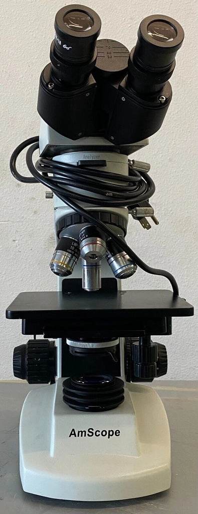 Dual Illumination Polarized Light Compact Trinocular Metallurgical Microscope.