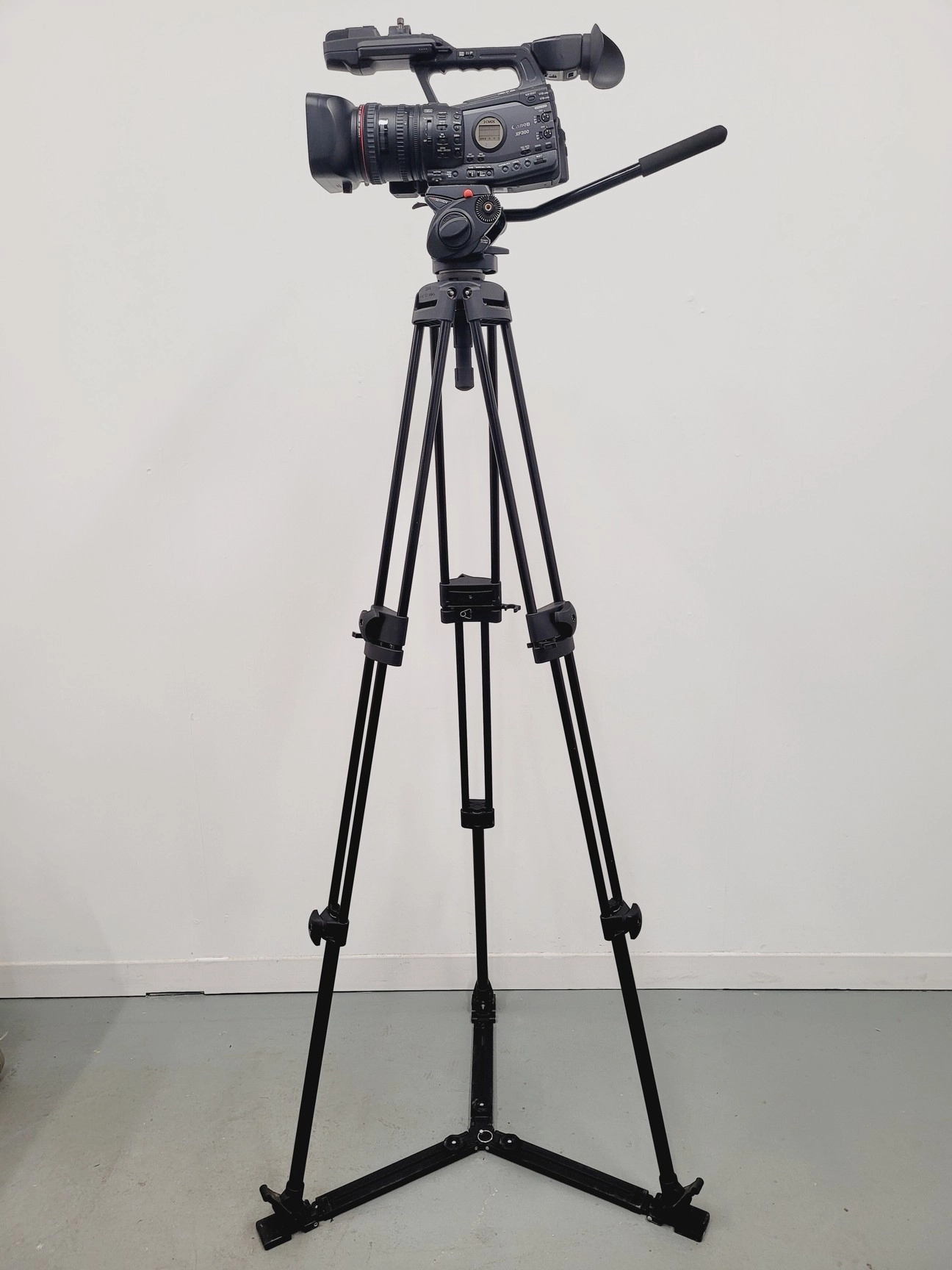 Canon XF305 HD PAL Video/Camera Camcorder and Manfrotto 520 MVB Tripod