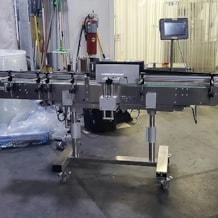 CVC300C Wrap Labeler with C head and 6&rdquo; Wide Conveyor