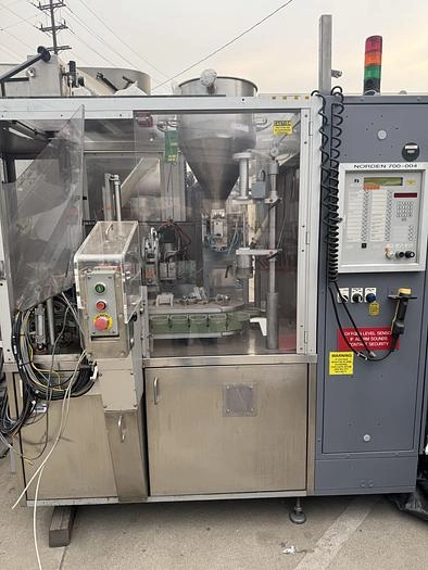 Norden Model 700 Tube Filler,