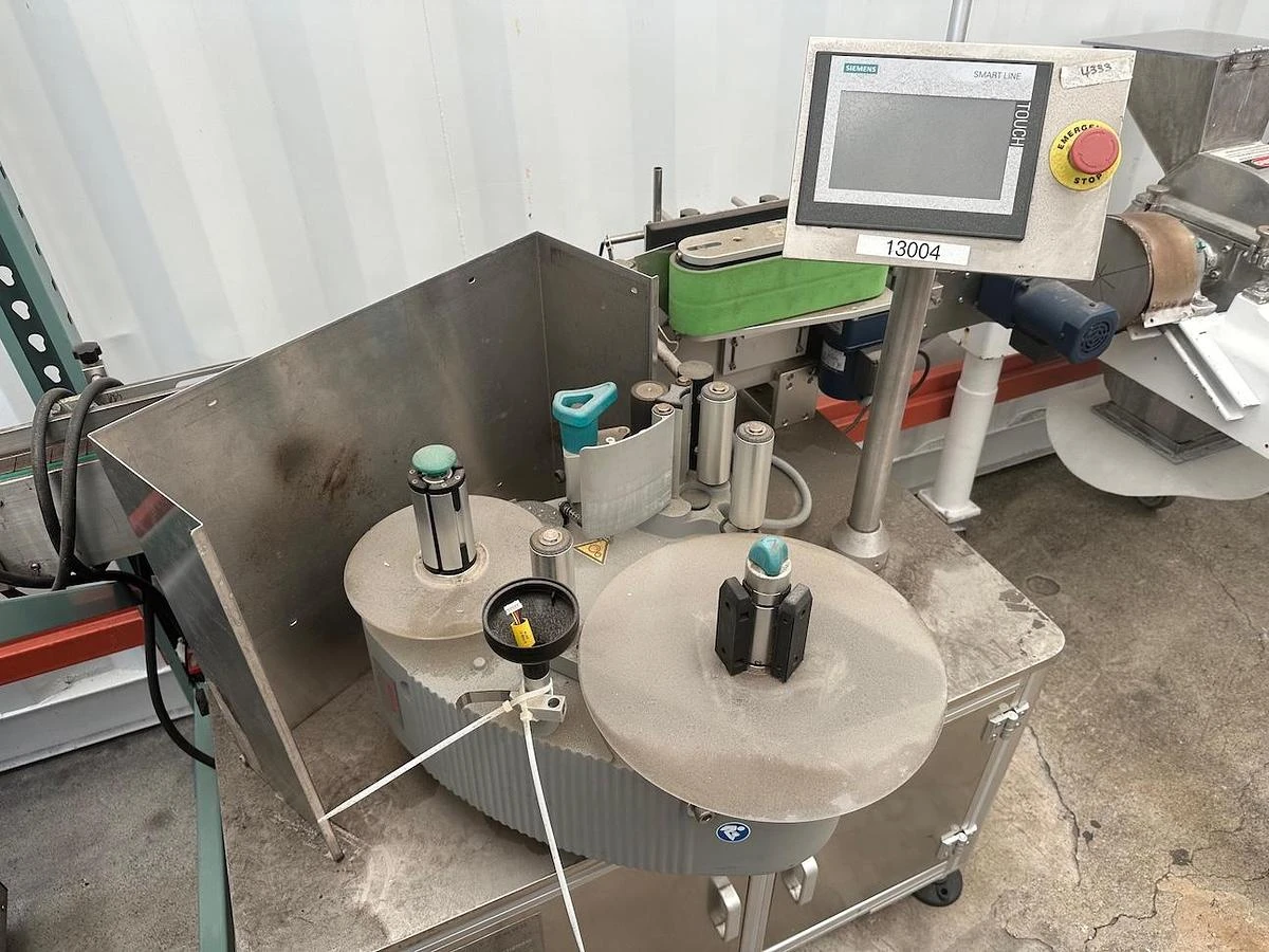 Labeler for round bottles, Model BLM