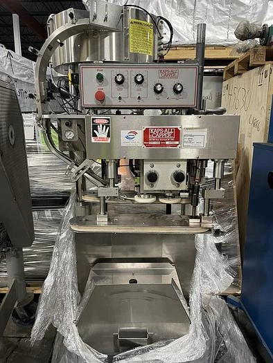 Kaps-All model E 4 spindle capper