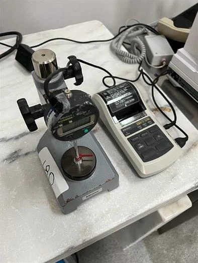 Mitutoyo model 7004 thickness tester with Mitutoyo model DP-1VR Digimatic mini processor printer