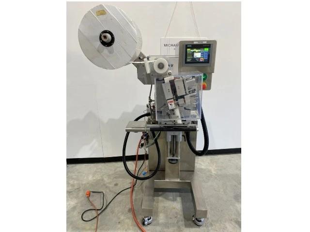 CVC Desiccant Pouch Inserter